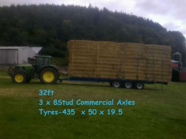 trac tractors hay bales